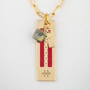 Cardinal Red Leather with gold necklace