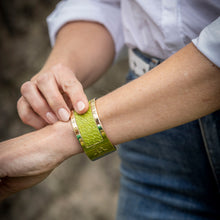 Load image into Gallery viewer, Verde leather on bracelet in nature
